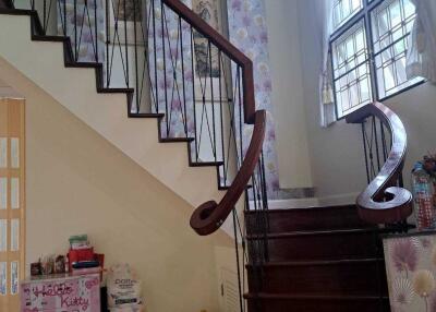 Indoor staircase with wooden steps and decorative elements