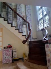 Indoor staircase with wooden steps and decorative elements