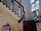 Indoor staircase with wooden steps and decorative elements