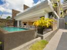 Modern exterior view of a luxurious home with a pool