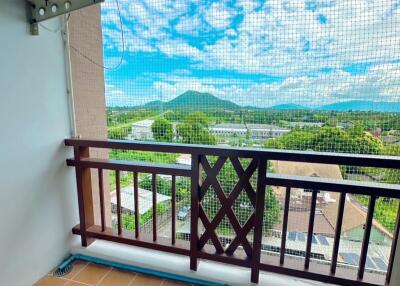 Spacious balcony with scenic mountain view