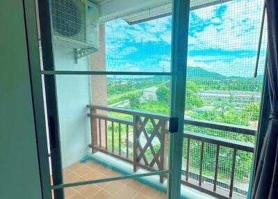 View of balcony through sliding glass door