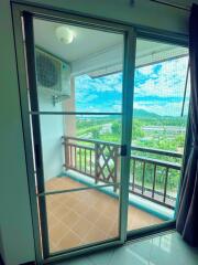 View of balcony through sliding glass door