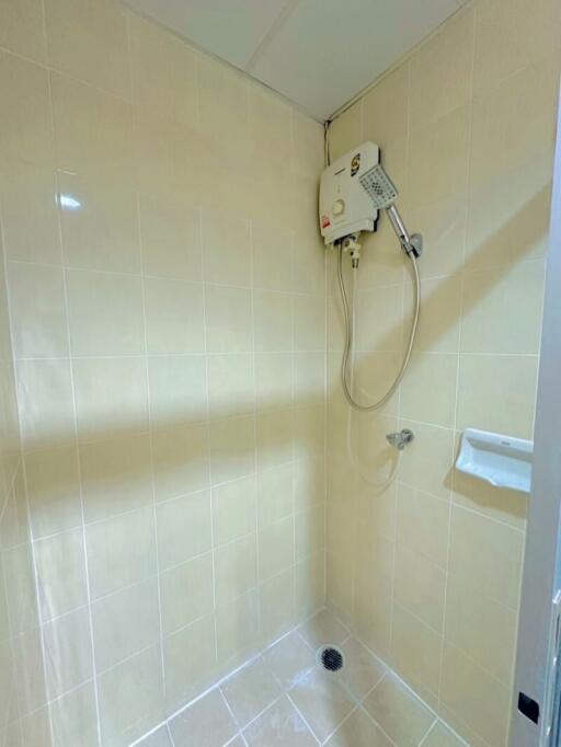 A bathroom with a shower