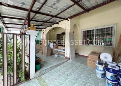 Covered patio area with supplies