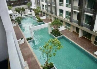 Aerial View of Modern Apartment Complex with Swimming Pools