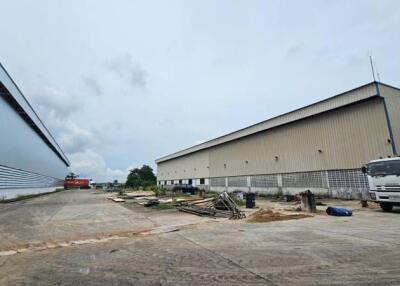 Outside view of warehouse buildings and parking area