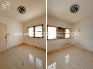 Basic unfurnished bedroom with tiled floor and windows