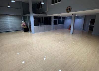 Spacious commercial interior with tiled flooring