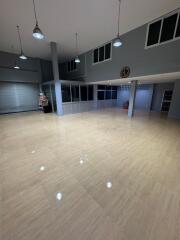 Spacious commercial interior with tiled flooring