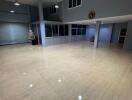 Spacious commercial interior with tiled flooring