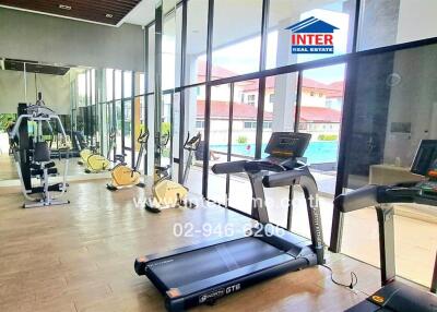 Modern gym with cardio and strength training equipment