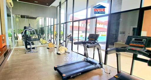 Modern gym with cardio and strength training equipment