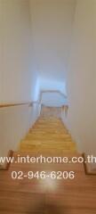 Wooden staircase with handrail