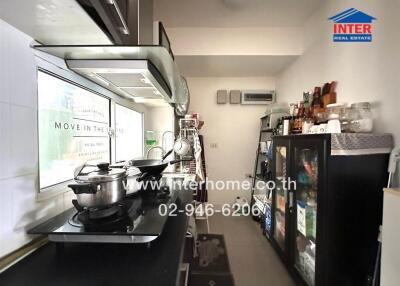 Modern kitchen with appliances and storage units