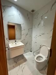 Modern bathroom with marble tiles