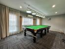 Recreational room with a pool table