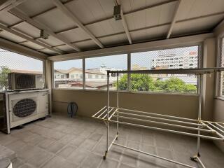 Enclosed laundry area with ample natural light