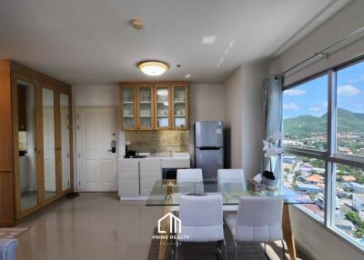 Modern kitchen and dining area with large windows