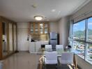 Modern kitchen and dining area with large windows