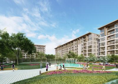 Spacious residential complex with lush greenery and outdoor recreational area.