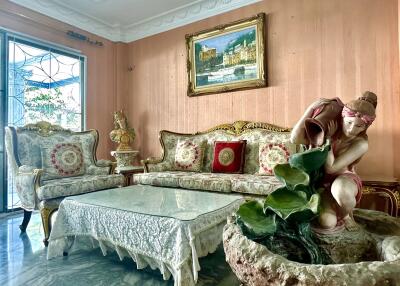 Elegant living room with ornate furniture and decor