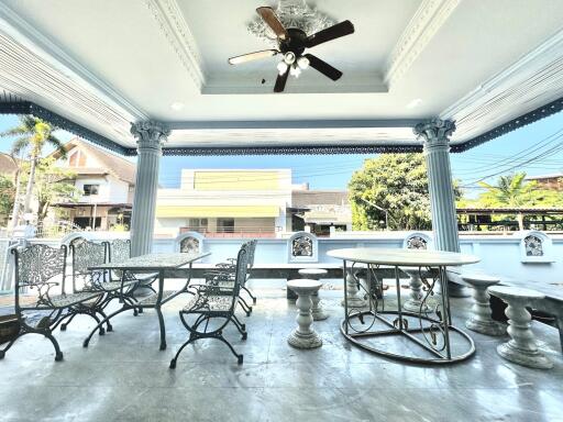 Spacious outdoor patio with seating area