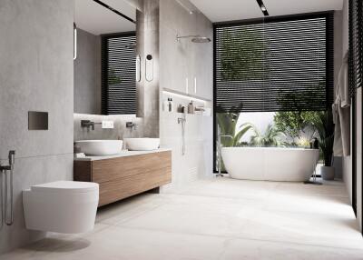 Modern bathroom with bathtub, double sinks, and large window