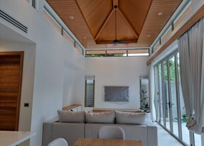 Spacious modern living room with high ceiling