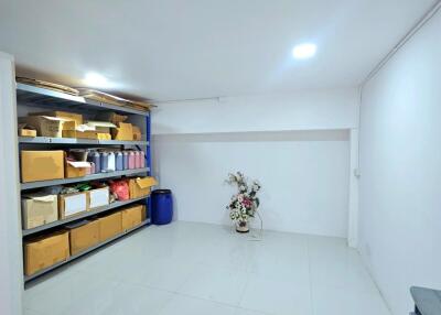 Clean storage room with shelves and boxes