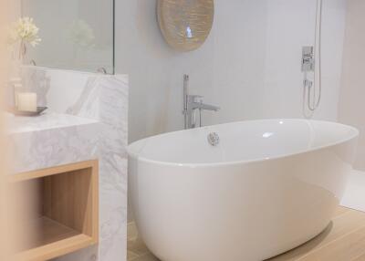 Modern bathroom with freestanding bathtub