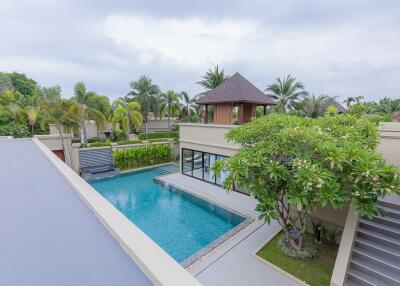 Outdoor area with pool and garden