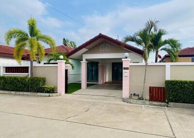 Front view of a residential house with a driveway