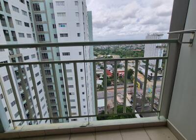 View from balcony overlooking buildings and city landscape