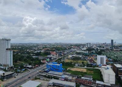 Aerial view of a cityscape with buildings and roads