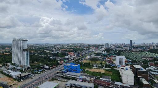 Aerial view of a cityscape with buildings and roads