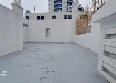 Empty outdoor area with surrounding walls