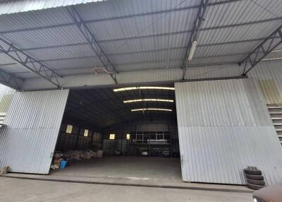 Spacious warehouse with large entrance doors