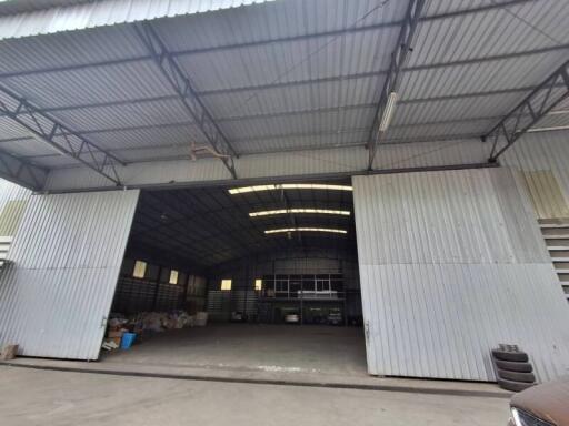 Spacious warehouse with large entrance doors