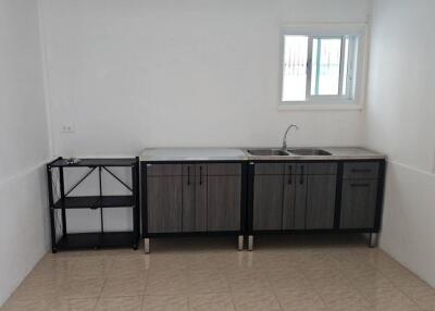 Minimal kitchen with basic amenities