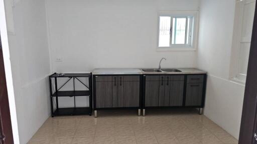 Minimal kitchen with basic amenities