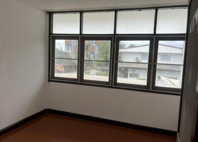 Bedroom with large windows