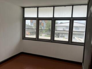 Bedroom with large windows