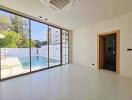 Modern living room with pool view