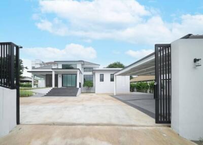 Modern house exterior with large driveway