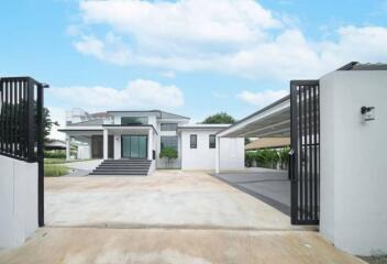 Modern house exterior with large driveway