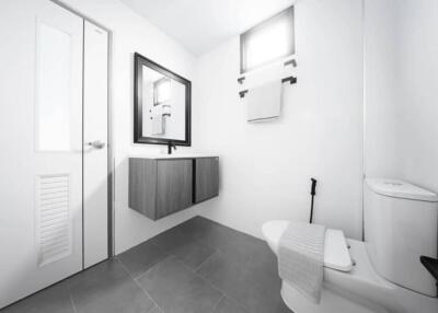 Modern bathroom with floating vanity and toilet