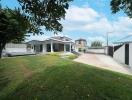 Modern house with garden and driveway