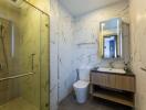 Modern bathroom with glass shower and floating vanity