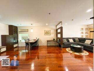 Spacious living room with dining area and modern furnishings